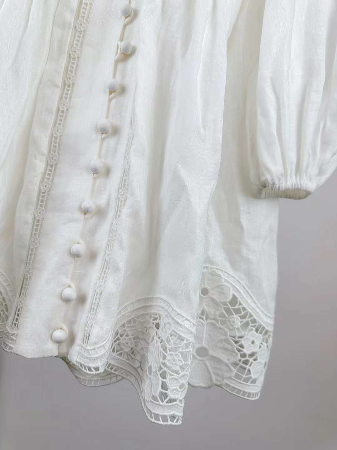 The August Plunge Mini Dress in Ivory and Mustard Floral from our Resort Swim 2024 Collection