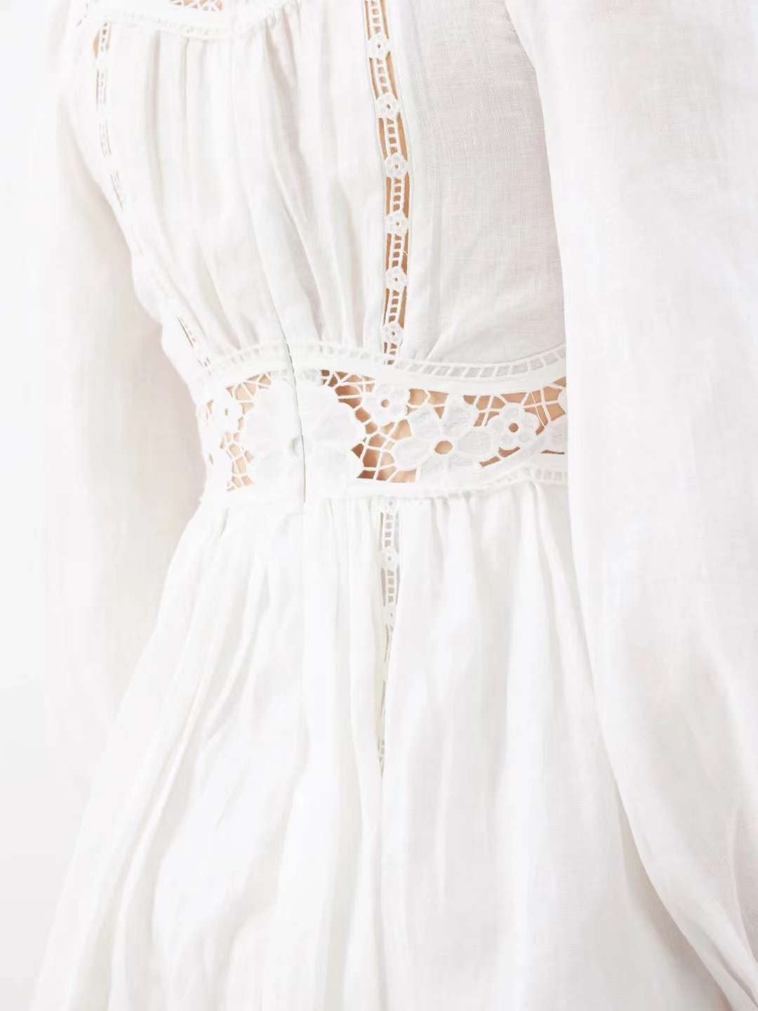 The August Plunge Mini Dress in Ivory and Mustard Floral from our Resort Swim 2024 Collection